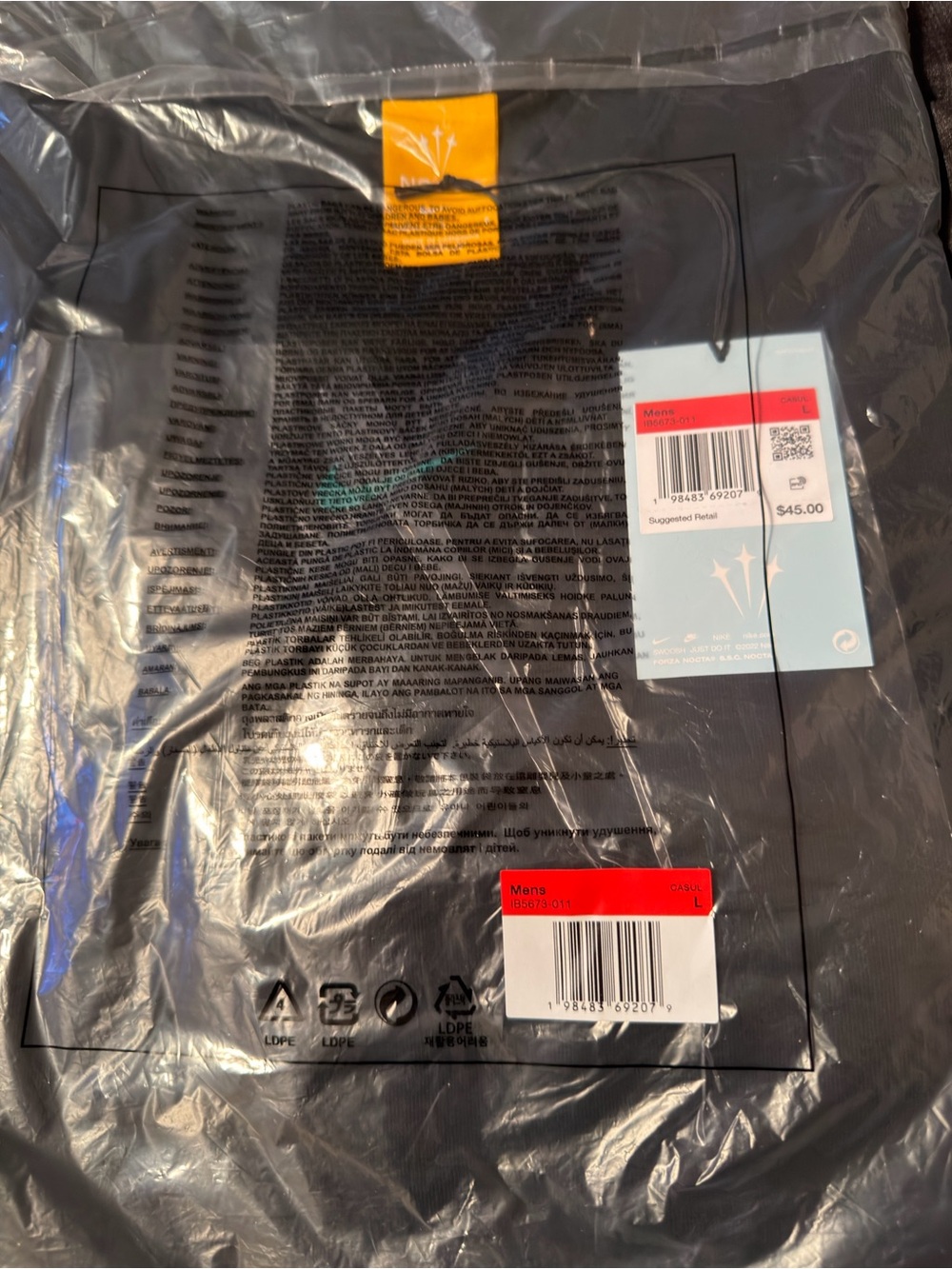 Nike Men's Black Short Sleeve Tee with Teal Swoosh Accent